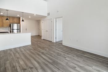a kitchen and living room in a 555 waverly unit